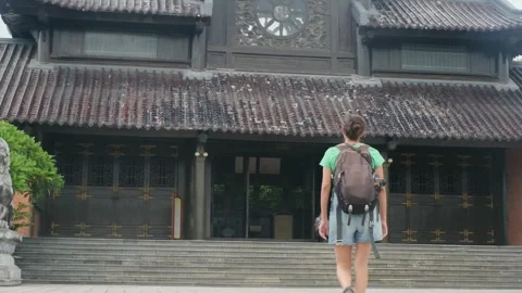 Explorer, navigating the enigmatic Southeast Asian temples Stock Footage 248513525