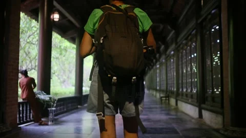 Explorer, navigating the enigmatic Southeast Asian temples Stock Footage 248513529