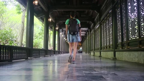 Explorer, navigating the enigmatic Southeast Asian temples Vídeos de archivo 248513546