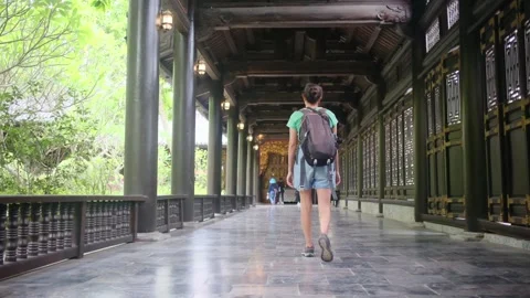 Explorer, navigating the enigmatic Southeast Asian temples Stock Footage 248513550