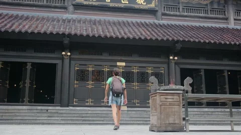 Explorer, navigating the enigmatic Southeast Asian temples Stock Footage 248513778
