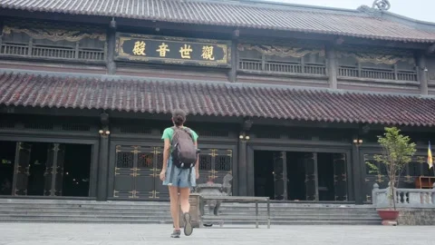 Explorer, navigating the enigmatic Southeast Asian temples Stock Footage 248513787