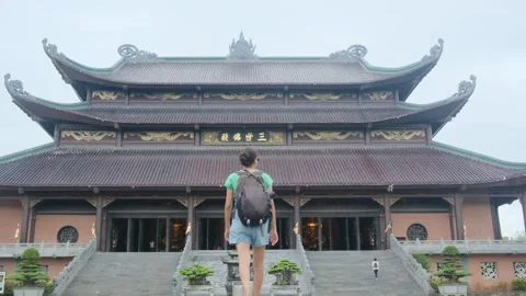 Explorer, navigating the enigmatic Southeast Asian temples Stock Footage 248514012