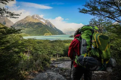 Explorer observes the lake Stock Photos
