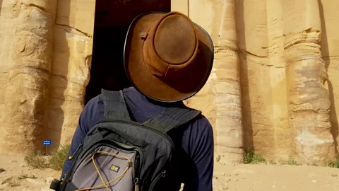 Explorer Viewing Petra Ruins in Awe Stock Footage 154804674