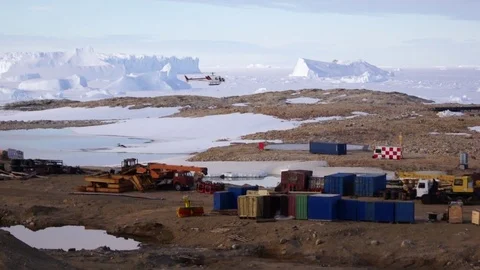 Explorers on the Antarctic coast Stock Footage 92412599