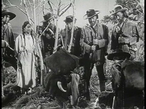 Explorers William Clark and Meriwether Lewis make their way down the Yellowstone Stock Footage 79467573