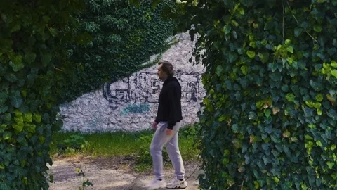 Exploring Abandoned Architecture Overgrown by Nature Stock Footage 237997567