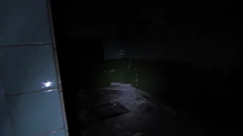 Exploring an abandoned building with torch light 스톡 동영상 58290426
