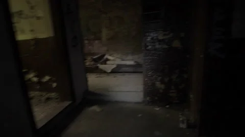 Exploring an abandoned building with torch light Stock Footage 58292241