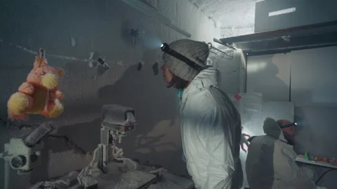 Exploring abandoned laboratory. Silent scientist reviewing old artifacts. Lone Stock Footage 346521868
