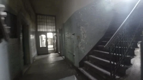 Exploring the Abandoned Ruins of a Mysterious Old Building Stock Footage 278533787