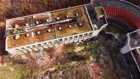 Exploring abandoned structure surrounded by nature's reclamation Stock Footage 327144306
