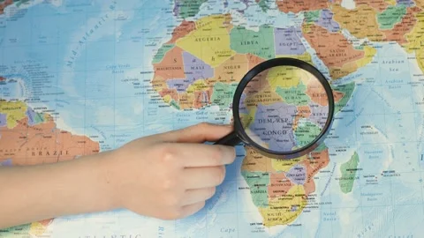 Exploring Africa on the paper map Stock Footage 151114127