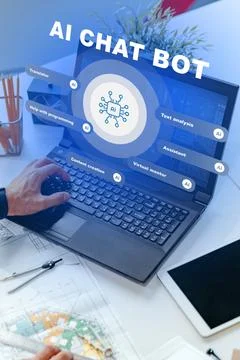 Exploring AI chat bot features at a desk with tools and a laptop in a workspace Stock Photos