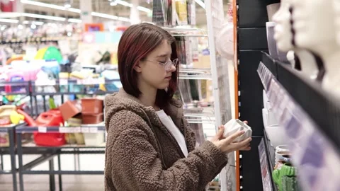 Exploring aisles of creativity in a vibrant store filled with treasures 스톡 동영상 296146264