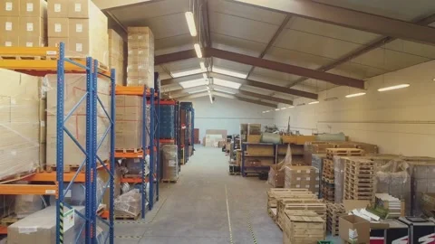Exploring the Aisles: A Reverse Tracking Shot in a Retail Distribution Warehouse Stock Footage 270495287