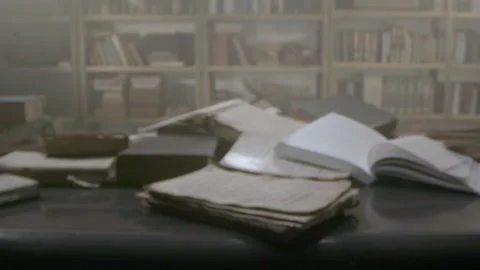 Exploring ancient Arabic manuscripts and books in a historic library setting 스톡 동영상 319058425