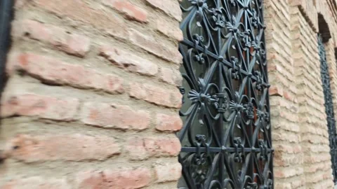 Exploring ancient architecture, intricate wrought iron and brick walls Vidéo 310301772