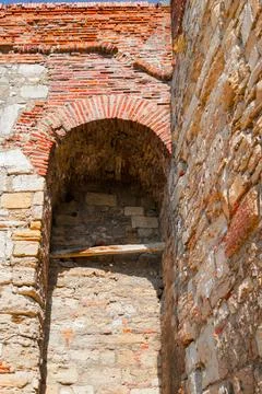 Exploring ancient brick and stone architecture in a historic structure Stock Photos