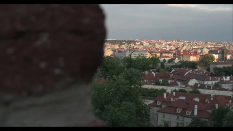 Exploring the ancient fortress with stunning views of the city skyline at dusk Video stock 283795487