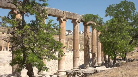 Exploring ancient Roman ruins in Jerash with tall columns Stock Footage 329175865