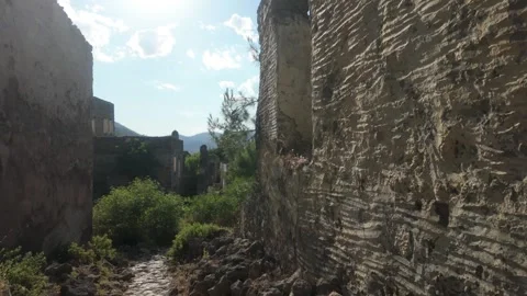 Exploring Ancient Stone Ruins and Abandoned Village Architecture Stock Footage 338203290
