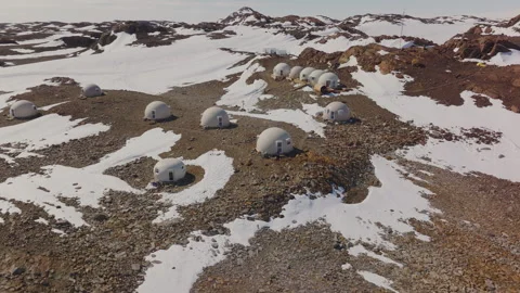 Exploring the Antarctica Science Station Amongst Snowy Mountain Terrain Stock Footage 288165276