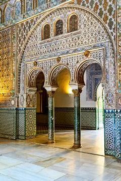 Exploring arches and patterns at Alcazar in Seville 写真素材