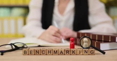 Exploring the art of benchmarking in a cozy workspace filled with creativity and Stock Footage 319070340