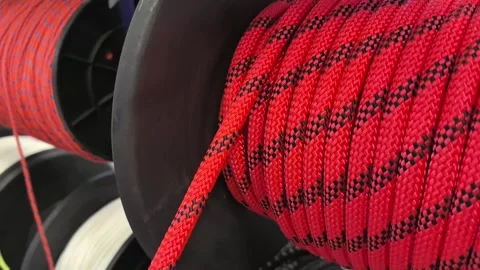 Exploring the art of weaving colorful rope in a vibrant workshop Stock Footage 340197231