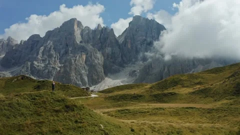 Exploring beautiful mountains with clouds and sunlight Stock Footage 320319823