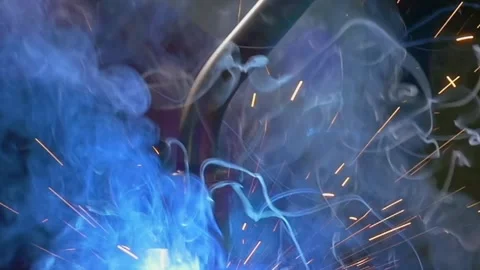 Exploring the Beauty of Industrial Argon Welding in Stunning Slow Motion Stock Footage 341068323