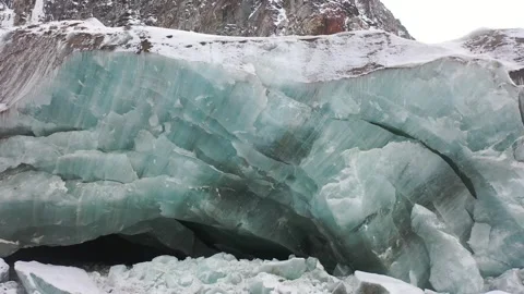 Exploring Blue Ice Cave in Tibet Stock Footage 345179457