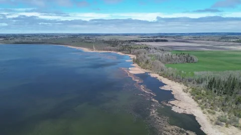 Exploring the Boundary Between Water and Land from an Aerial View Stock Footage 312237411