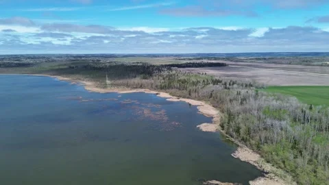 Exploring the Boundary Between Water and Land from an Aerial View Stock Footage 312237695