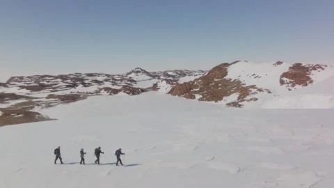 Exploring breathtaking glacier landscapes during an exhilarating snow hiking Stock Footage 288170235