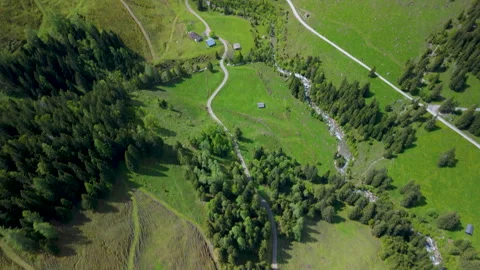 Exploring breathtaking landscapes and winding trails in a serene mountain Video stock 314078228