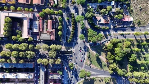 Exploring the Bustling Intersection of City Streets in Vibrant Italy During Stock Footage 280314245