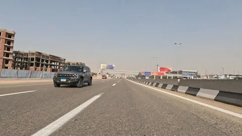 Exploring Cairo Ring Road Car Passing Major Interchanges and Busy City Districts Video stock 329832382