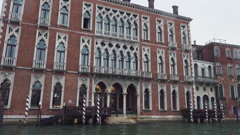 Exploring the canals of venice by boat Vídeo Stock 169444887