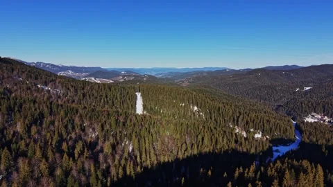 Exploring the Carpathian Mountains in Bulgaria on a clear winter day Stock Footage 337990059