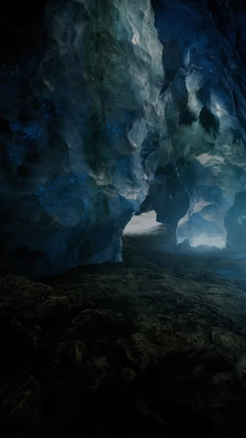Exploring a cave with blue ice formations during a cold day Stock Footage 335946389