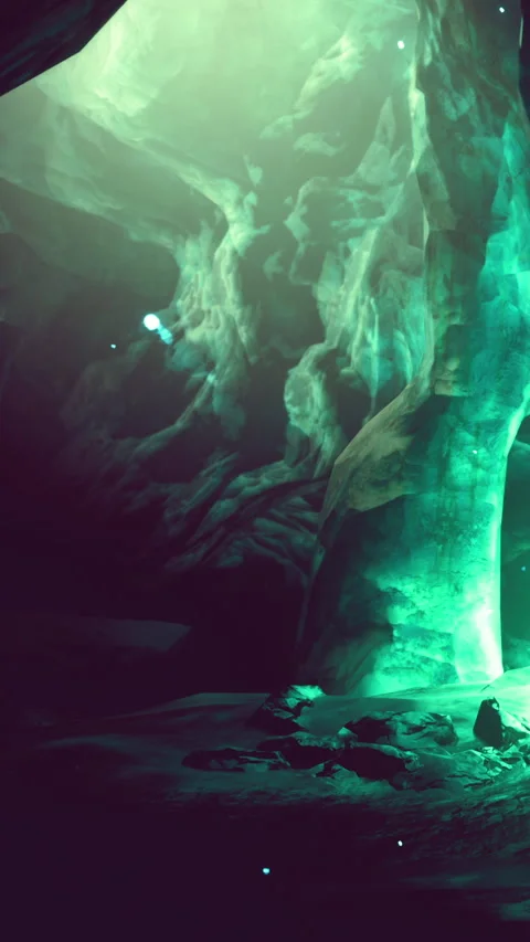 Exploring a cave with green light and glowing particles during night time Stock Footage 338002384