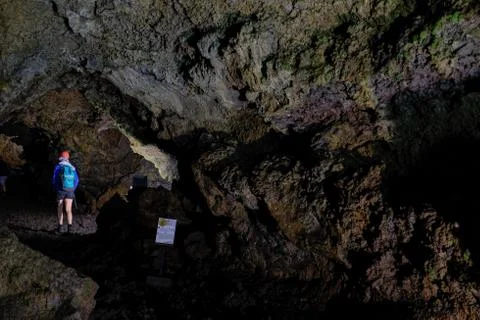 Exploring cave Fotos Stock