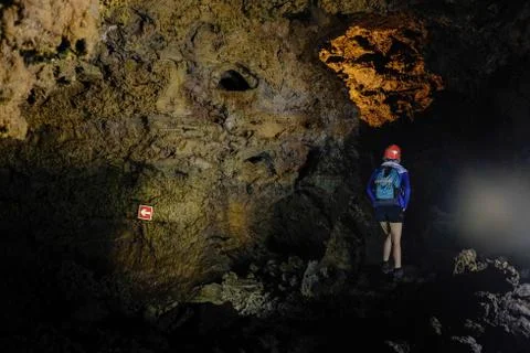 Exploring cave Fotos Stock