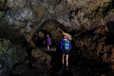 Exploring cave Stock Photos