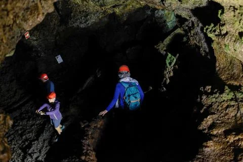 Exploring cave Stock Photos