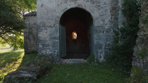Exploring the chapel old wall grass and its serene surroundings at dusk Stock Footage 321494086