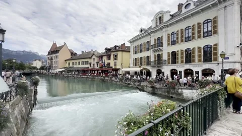 Exploring the charming canals and historic architecture of Annecy Stock Footage 314144134